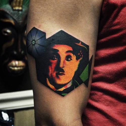 By David Côté, done at Imperial Tattoo Connexion, Montreal.... psychedelic;charlie chaplin;davidcote;patriotic;contemporary;character;facebook;twitter;pop art;experimental;portrait;medium size;other;england;upper arm