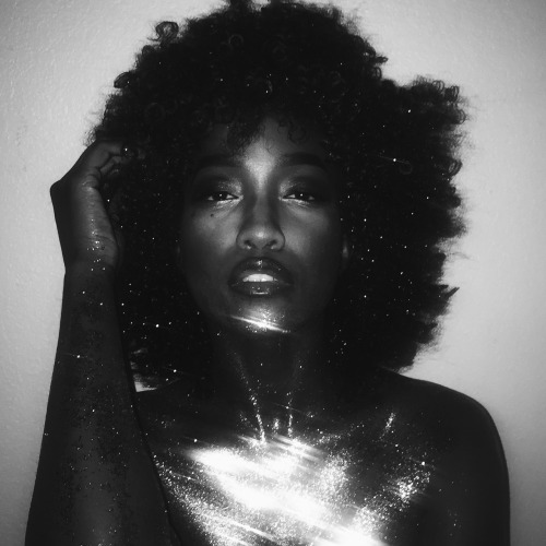 black beauties dark skin women queen austin afropunk afrocentric melanin glow in the dark glow discoqueen 70s goddess naturalhair model black and white melanin goddess meighanzaimoy