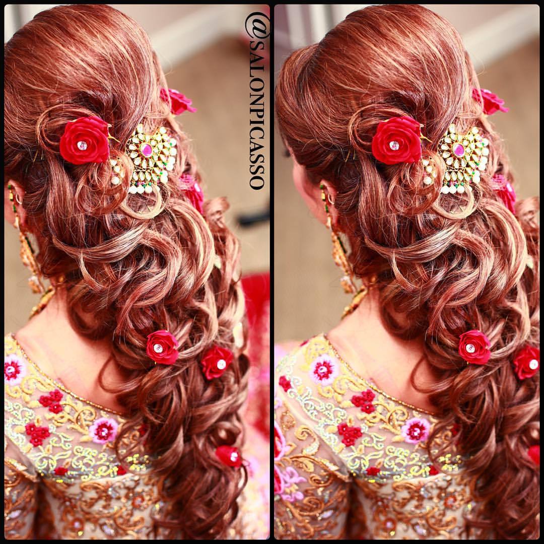 Bride S Braided Updo With Side Red Roses Wedding Hairstyle