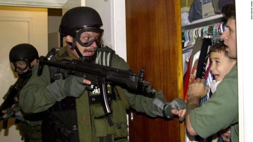 congenitaldisease:
“This picture depicts 6-year-old Elian Gonzales as he is seized by US Federal Agents during an early morning raid on his family’s home in Little Havana, Florida.
Elian had had come to Florida after he was found floating in an inner...