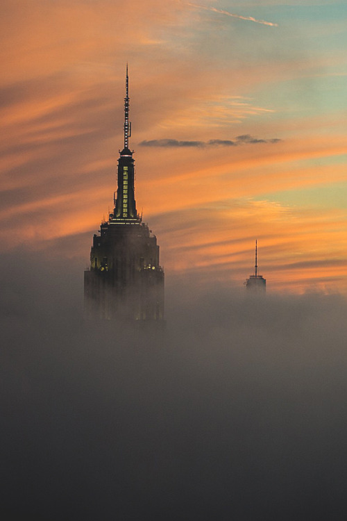 visualechoess:Empire State Building in the Fog - by: Paul Kaye