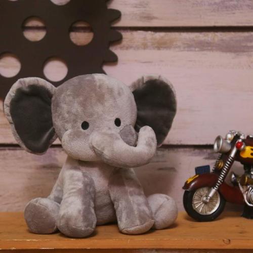 whirelez:Plush ElephantFrom ear to toes 10 inches, filling...