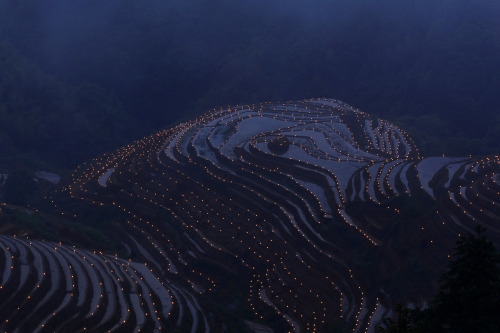 killing-the-prophet:Thousands of torches are placed in terraced...