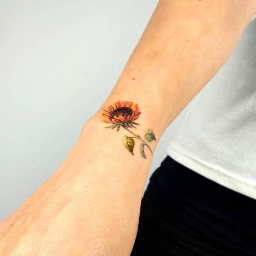 Sunflower temporary tattoo by Lena Fedchenko, get it here ►... flower;sunflower;nature;temporary;lenafedchenko