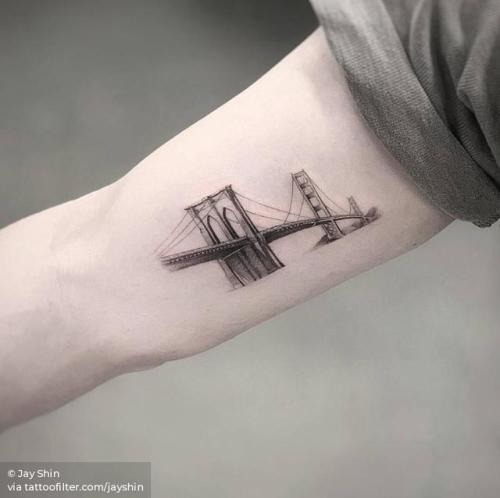Golden Gate Bridge tattoo on the inner forearm