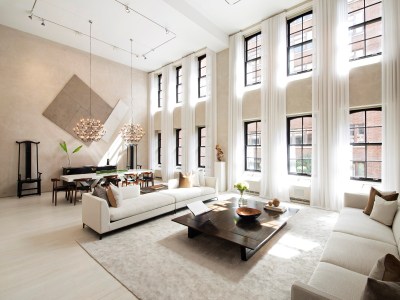 Beautiful living and dining area with double-height ceiling allowing lots of natural light in this luxury apartment in NYC. [1600 × 1200]