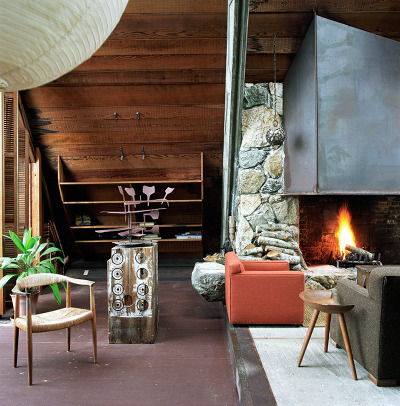 skidmoreowingsmerrill:<br />An Architect’s Home<br />The warm refuge of this California home stands in stark contrast to its rugged surroundings in the Carmel Highlands. In the autumn of 1952, Nathaniel Owings, a founding partner of SOM, scrambled up a stretch of the Big Sur coastline with Margaret Wentworth. They found respite on an idyllic slice of land, where they picnicked and resolved to make the place their home after they married. A year later, they returned to build “Wild Bird” on this very perch out of concrete and reclaimed redwood. As Owings later said in an interview with Time magazine, “No house can do more than snuggle into and grab hold of and hold on to a sheer bit of granite on this coast.” Working with architect Mark Mills, they set the A-frame structure into the cliffside and surrounded it with cantilevered balconies to take in the Big Sur landscape. Owings, who was born on this day in 1903, would spend much of his life in the coastal residence. As he told the magazine, “This is a onetime house for the rest of the time we expect to be here on earth.”<br />Photos © Richard Waite<br /> skidmoreowingsmerrill:<br />An Architect’s Home<br />The warm refuge of this California home stands in stark contrast to its rugged surroundings in the Carmel Highlands. In the autumn of 1952, Nathaniel Owings, a founding partner of SOM, scrambled up a stretch of the Big Sur coastline with Margaret Wentworth. They found respite on an idyllic slice of land, where they picnicked and resolved to make the place their home after they married. A year later, they returned to build “Wild Bird” on this very perch out of concrete and reclaimed redwood. As Owings later said in an interview with Time magazine, “No house can do more than snuggle into and grab hold of and hold on to a sheer bit of granite on this coast.” Working with architect Mark Mills, they set the A-frame structure into the cliffside and surrounded it with cantilevered balconies to take in the Big Sur landscape. Owings, who was born on this day in 1903, would spend much of his life in the coastal residence. As he told the magazine, “This is a onetime house for the rest of the time we expect to be here on earth.”<br />Photos © Richard Waite<br />