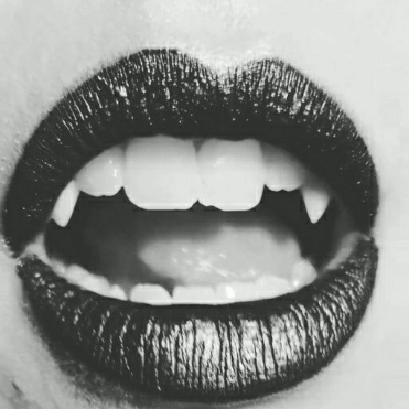 vampire teeth gif