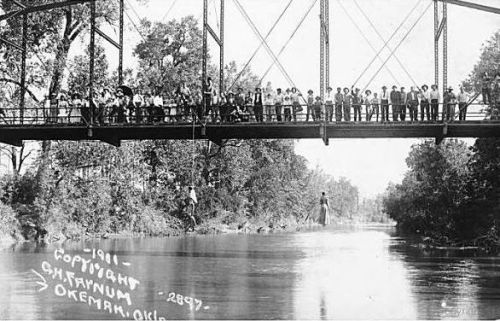 congenitaldisease:
“The grim photograph above depicts the lynching of Laura Nelson and her 15-year-old son, L.D. Nelson. Disturbingly, this photograph was once used as a proud postcard for Okemah, Oklahoma. On the 2nd of May, 1911, Deputy Sheriff...