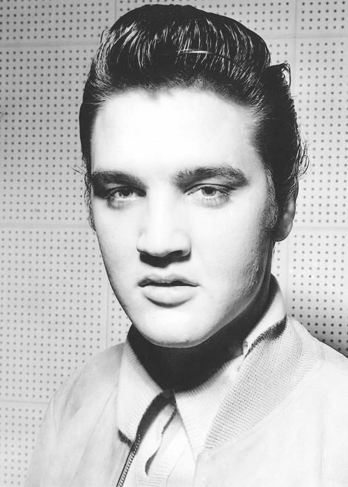 ELVIS PRESLEY - Elvis at Sun Studio in Memphis, December 4, 1956.