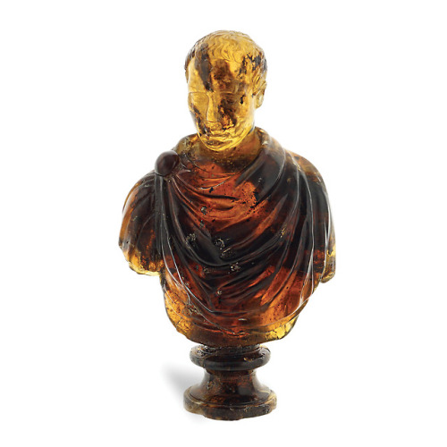 ganymedesrocks:The Fiery Emperor - A Natural Amber Bust19th...