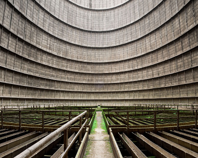 thibaudpoirier:<br /><br />Inside an abandoned cooling tower. This particular one is from the Electrabel power plant, located in Monceau-sur-Sambre, Belgium. Built in 1921, it produced energy from coal and was once responsable for 10% of the entire country’s CO2 emissions. It was shut down in 2007 and is now a symbol of the fading industrial region of Charleroi.Photography by Thibaud Poirier / Behance / Instagram