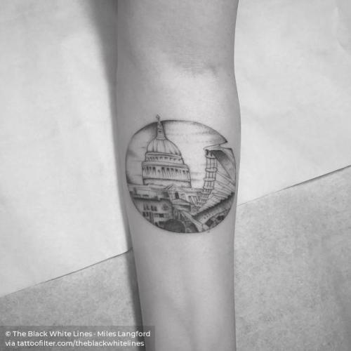 Landscape tattoo on the left inner arm