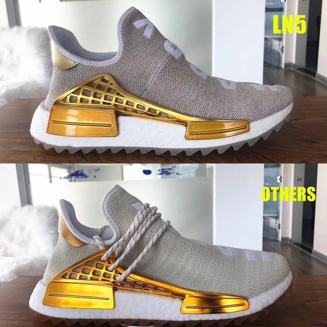 human race shoes gold