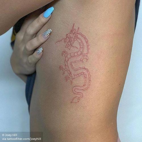 By Joey Hill, done at High Seas Tattoo Parlor, Los Angeles.... small;single needle;line art;dragon;rib;tiny;joeyhill;ifttt;little;red;experimental;medium size;on dark skin;mythology;other;fine line