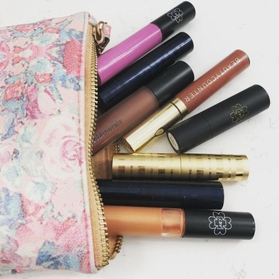 who else has this many lipsticks and glosses in their makeup bag/purse
