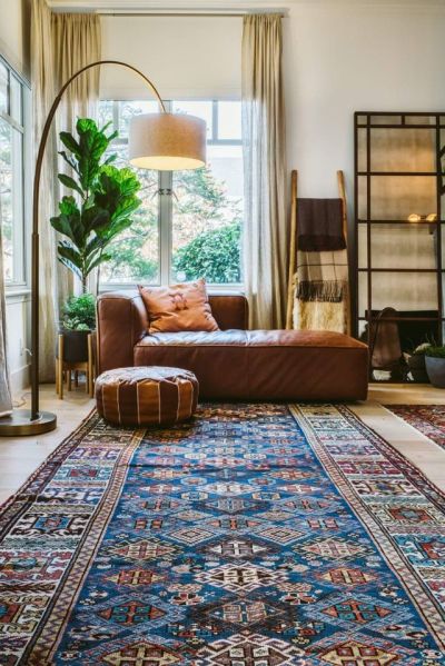 This San Francisco apartment is providing major textile inspiration. We love the contrast between the wood furniture and the rich rugs in the living room and office area. The bedroom has amazing layered blankets and rugs which adds to the overall cozy, boho vibe of the space. This San Francisco apartment is providing major textile inspiration. We love the contrast between the wood furniture and the rich rugs in the living room and office area. The bedroom has amazing layered blankets and rugs which adds to the overall cozy, boho vibe of the space.