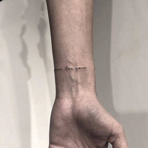 By Chang, done at West 4 Tattoo, Manhattan.... small;chang;the little prince;l essentiel est invisible pour les yeux;tiny;french tattoo quotes;ifttt;little;wristband;wrist;lettering;quotes;film and book;band