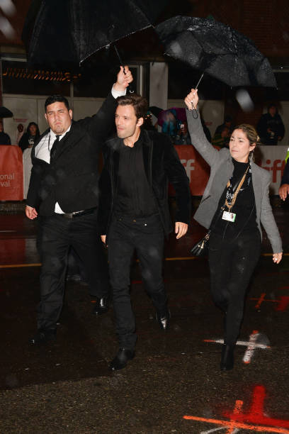 daybreak96:Seb stopping traffic to greet his fans in the rain at...