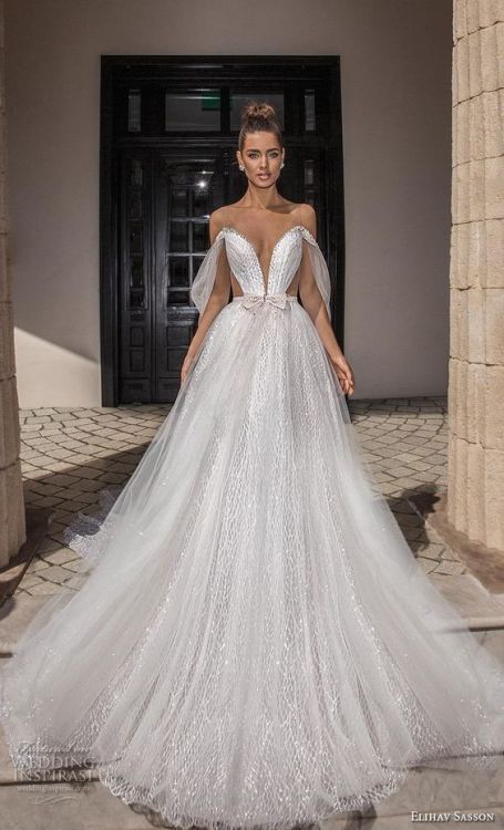 See more wedding gowns from this collection at...