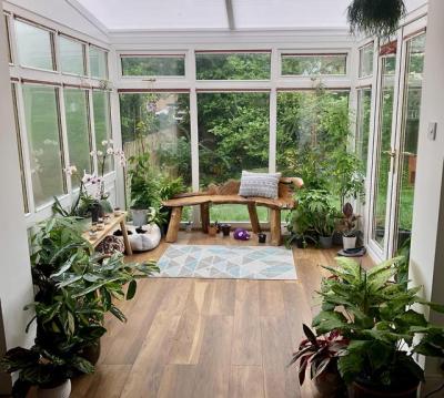 I was told you guys might like my sun room! There’s also two armchairs facing the bench (pulled back to show off the plants 🌿)