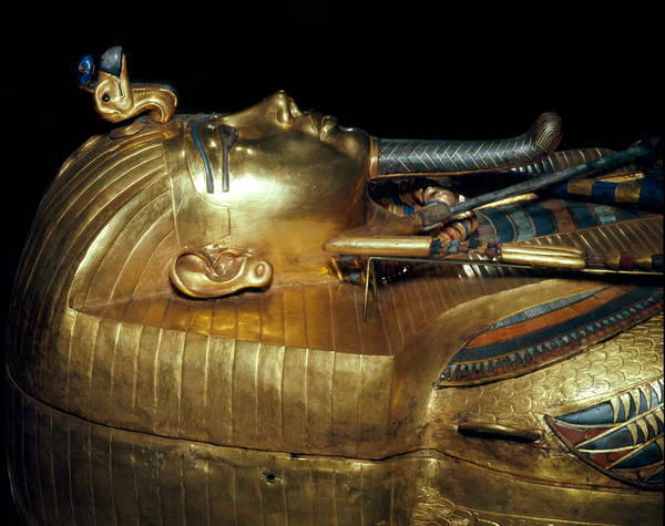 The Innermost Coffin of TutankhamunThis coffin of solid gold is covered with incised decorations and inscriptions inside and outside, with the names and epitaph of the deceased king and protective texts. It is inlaid with semiprecious stones and...