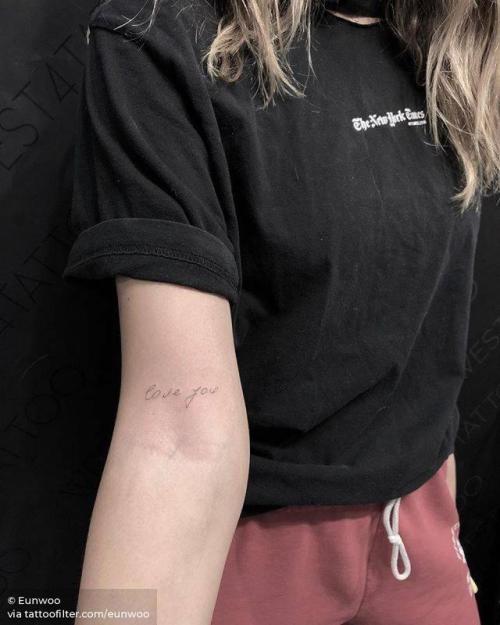 By Eunwoo, done at West 4 Tattoo, Manhattan.... english tattoo quotes;love you;small;single needle;bicep;eunwoo;languages;love quote;love;facebook;twitter;english;quotes