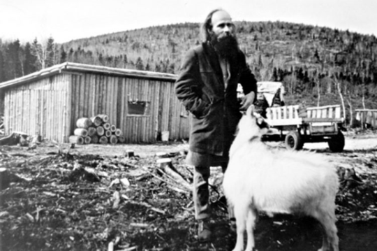 Roch Thériault was a Canadian cult leader standing with sheep