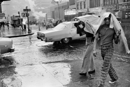 nycnostalgia:70s style in the rain8th Avenue and 43rd  Street