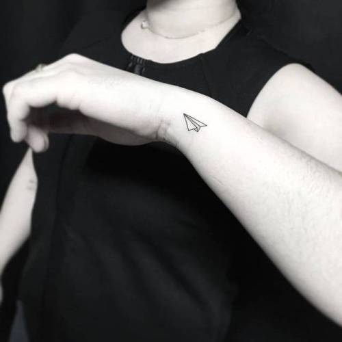 By Jing, done at Jing’s Tattoo, Queens.... jing;small;paper plane;micro;line art;tiny;travel;ifttt;little;wrist;minimalist;game;origami;fine line