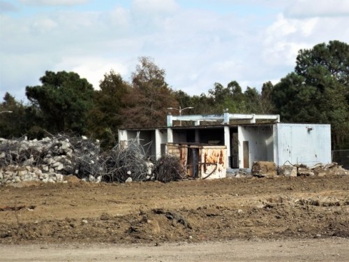 Demolition of the old school board buildings. The buildings were...