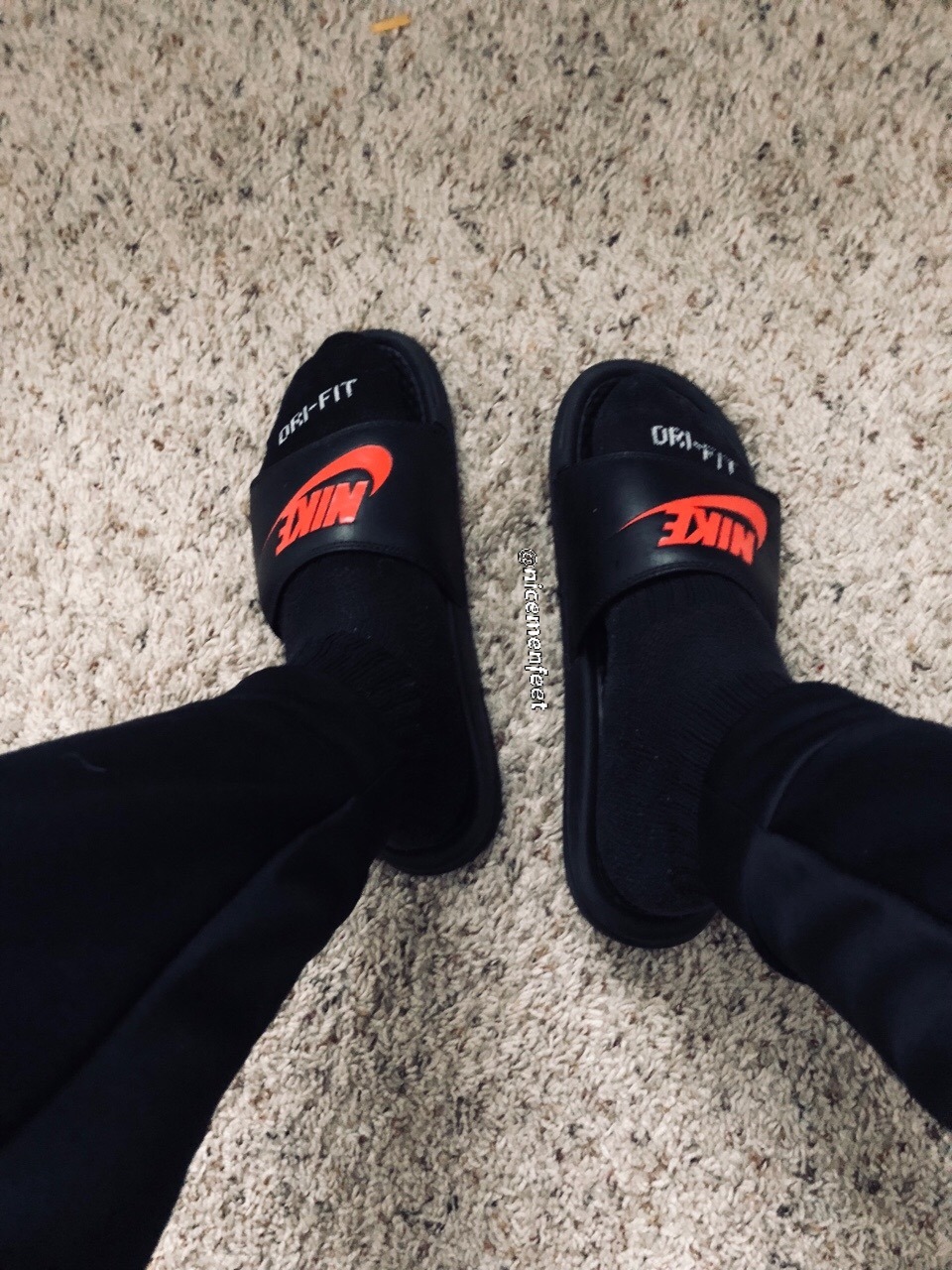 socks and nike slides