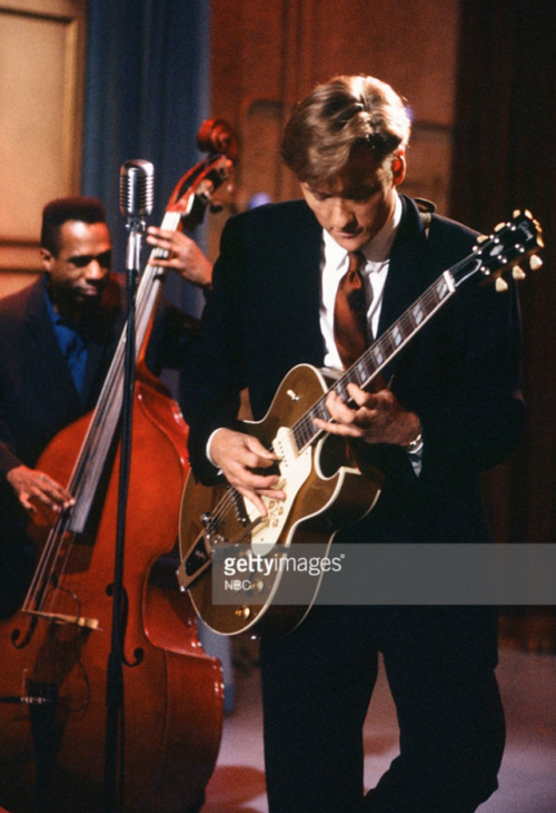 conanobrien1963:conan playing guitar on late night with conan...