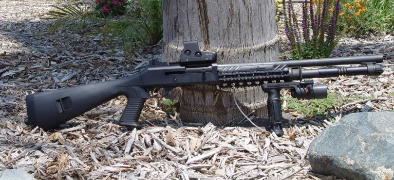 Benelli M4 with EOTech holographic sight, SureFire...