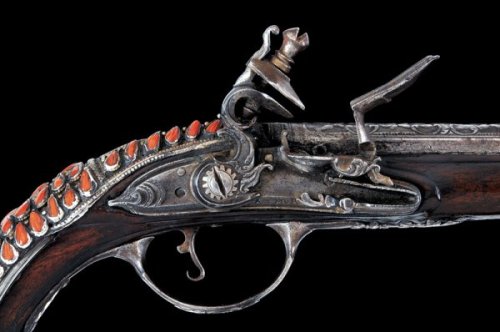 peashooter85:An original silver and coral mounted flintlock...