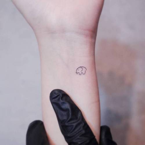 By Witty Button, done in Seoul. http://ttoo.co/p/36219 small;elephant;micro;line art;wittybutton;animal;tiny;ifttt;little;wrist;minimalist;fine line