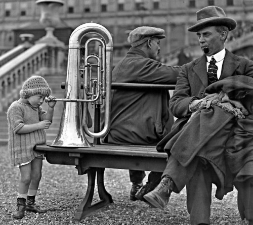 joeinct:A little girl peeks inside a tuba during the...