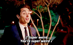gif of a man singing "Super weird, you're super weird"