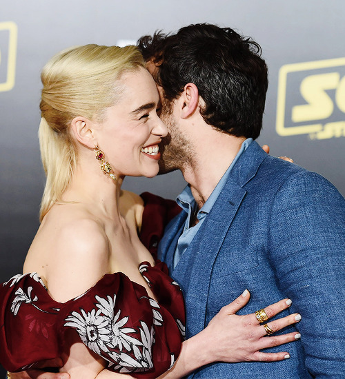 gifstarwars:Emilia Clarke and Alden Ehrenreich attend the...