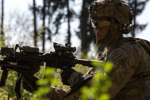 U.S Army soldiers and vehicles assigned to 1st Battalion, 63rd...