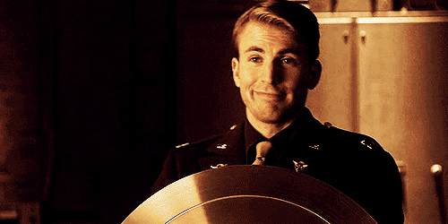 GIF of Captain America/Steve Rogers (Chris Evans) with his silver prototype shield