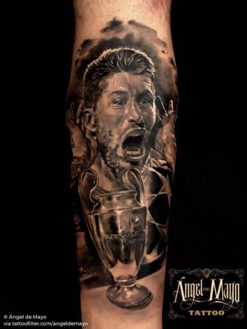 By Ángel de Mayo, done at Mulafest Madrid Tattoo Convention... angeldemayo;spain;healed;black and grey;calf;sergio ramos;real madrid;trophy;character;madrid;facebook;location;twitter;profession;champions league;sport;other;football;footballer;patriotic;big