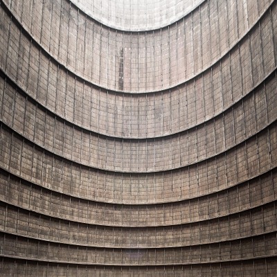 thibaudpoirier:<br /><br />Inside an abandoned cooling tower. This particular one is from the Electrabel power plant, located in Monceau-sur-Sambre, Belgium. Built in 1921, it produced energy from coal and was once responsable for 10% of the entire country’s CO2 emissions. It was shut down in 2007 and is now a symbol of the fading industrial region of Charleroi.Photography by Thibaud Poirier / Behance / Instagram