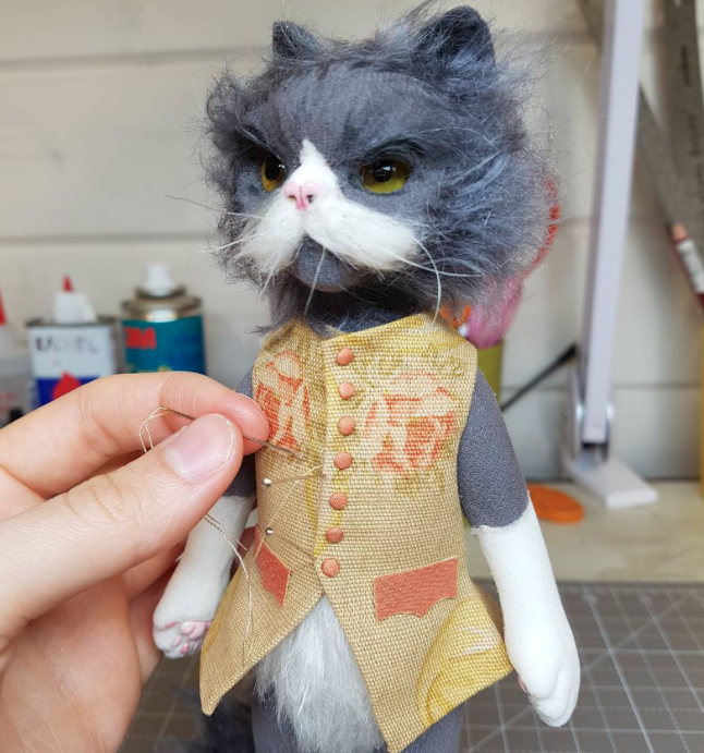 Creepy hotsell cat doll