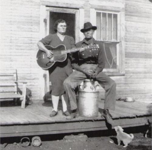 My great grandparents, circa 1940s, on their porch in southwest Oklahoma. Quite possibly one of my favorite old family photos. Check this blog!