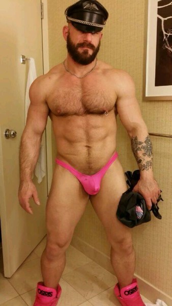 Does the pink g-string and high tops make him less butch? I think it’s hot!