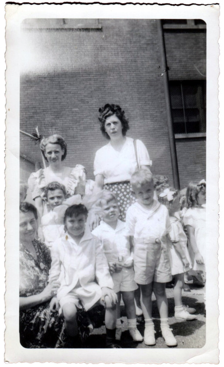 That’s my Grandma Gen with my Uncle Bob on her knee in the...