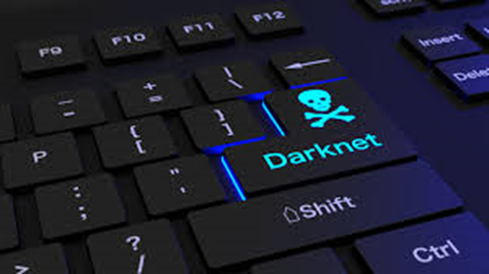 keyboard with the skeleton face in the enter key stating darknet