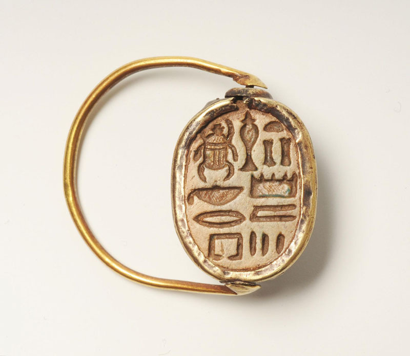 Ring Decorated with a Scarab  This gold finger ring has a scarab shaped bezel that can swivel. The inscription reads: ‘May you become a praised one, enduring in the temples.’
New Kingdom, 19th Dynasty or later, ca. 1292 BC or later.
Photo courtesy of...