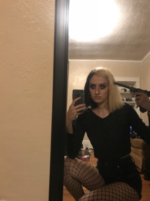 half back and blonde fishnet goth fishnet and shorts girls with piercings girls with tattoos guns done end me black black clothing dark makeuo lashes